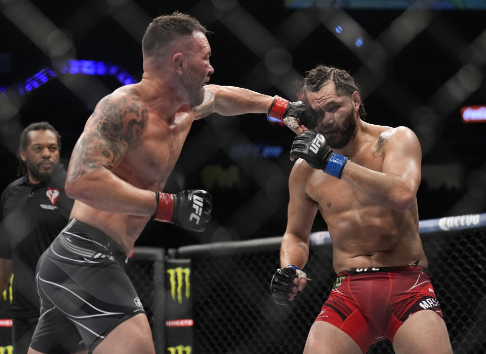 LAS VEGAS, NEVADA - MARCH 05: (L-R) Colby Covington punches Jorge Masvidal in their welterweight fight during the UFC 272 event on March 05, 2022 in Las Vegas, Nevada. (Photo by Chris Unger/Zuffa LLC)