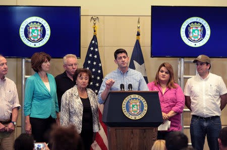 U.S. Speaker of the House Paul Ryan (C) addresses the media during a news conference with bipartisan lawmakers, after the island was hit by Hurricane Maria, in San Juan, Puerto Rico October 13, 2017. REUTERS/Alvin Baez
