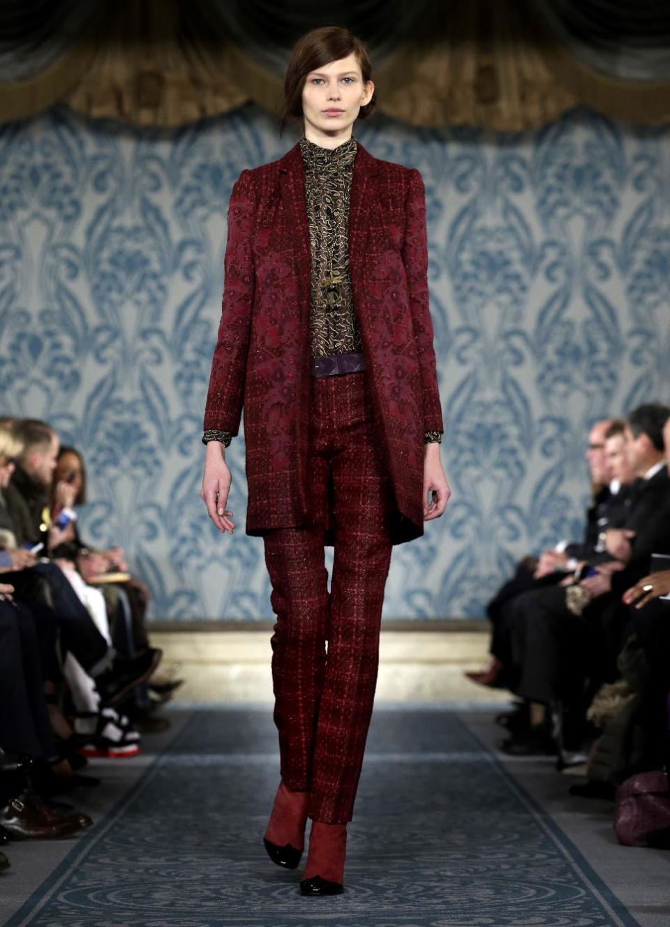 The Tory Burch Fall 2013 collection is modeled during Fashion Week in New York on Tuesday, Feb. 12, 2013. (AP Photo/Richard Drew)