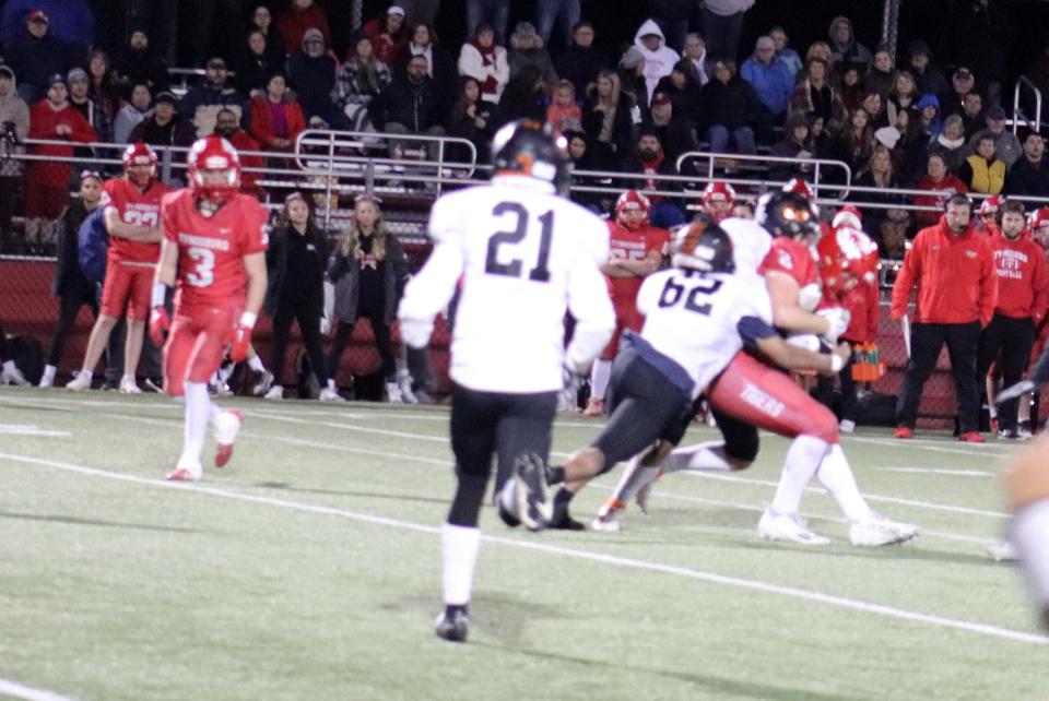 Gardner's Evans Cesaire (No. 62) makes a solid tackle on a Tyngsborough runner during a Division 7 playoff game on Friday, Nov. 3, 2023.