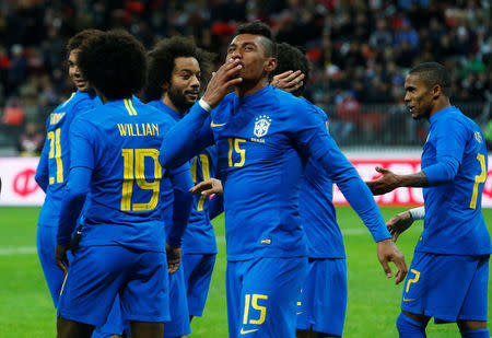 Soccer Football - International Friendly - Russia vs Brazil - Luzhniki Stadium, Moscow, Russia - March 23, 2018 Brazil’s Paulinho celebrates scoring their third goal REUTERS/Sergei Karpukhin