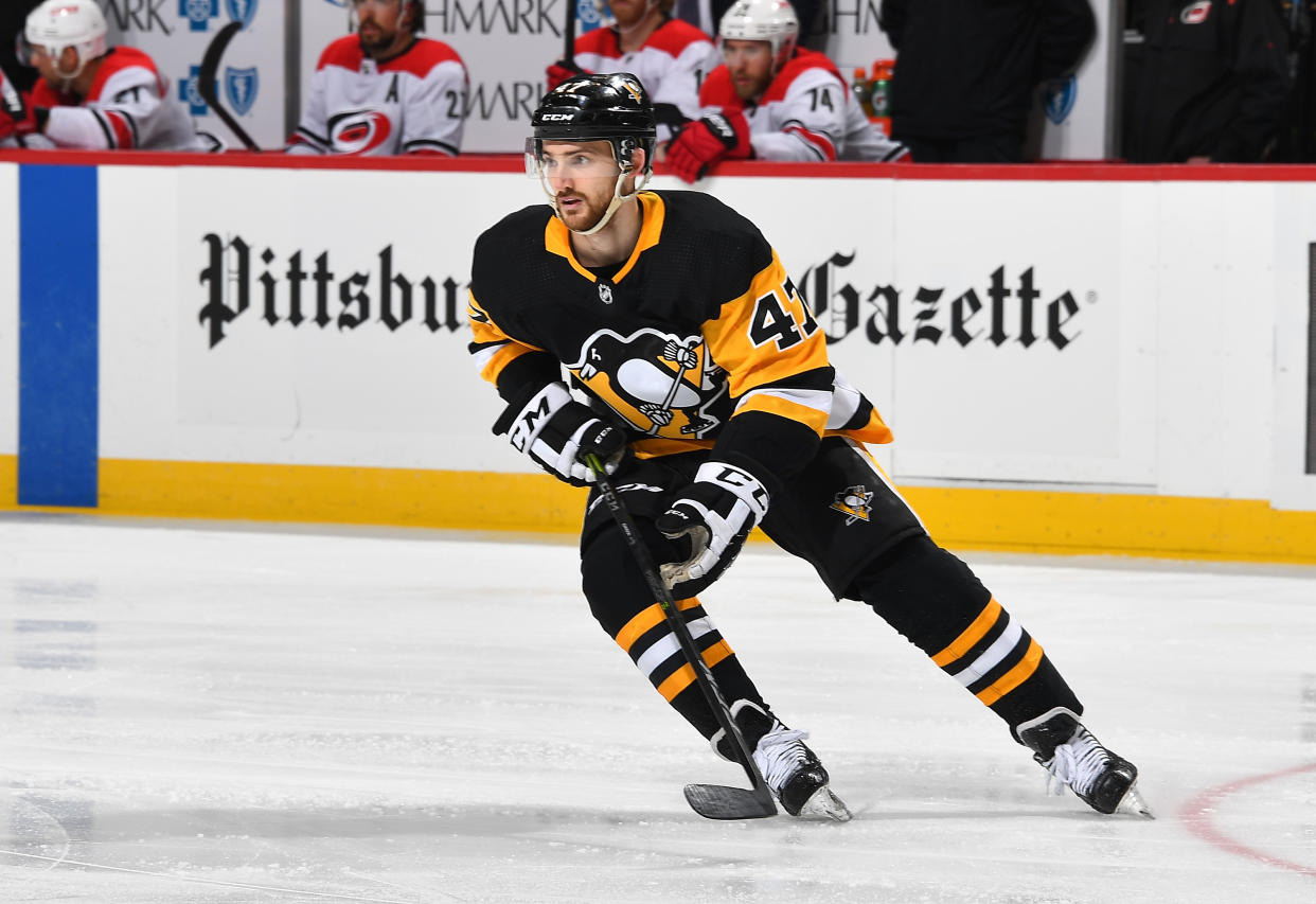 PITTSBURGH, PA - MARCH 31:  Adam Johnson #47 of the Pittsburgh Penguins skates against the Carolina Hurricanes at PPG Paints Arena on March 31, 2019 in Pittsburgh, Pennsylvania.  (Photo by Joe Sargent/NHLI via Getty Images)