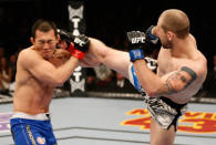 Alan Belcher versus Yushin Okami during their middleweight fight at UFC 155 on December 29, 2012 at MGM Grand Garden Arena in Las Vegas, Nevada. (Photo by Josh Hedges/Zuffa LLC/Zuffa LLC via Getty Images)