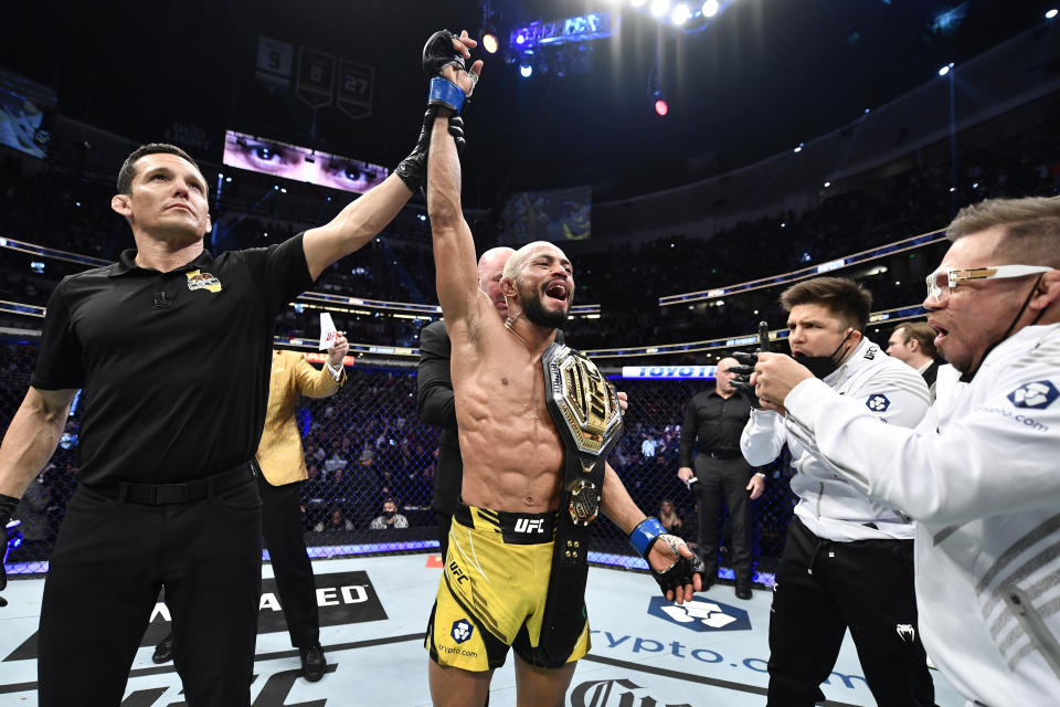 ANAHEIM, CALIFORNIA - JANUARY 22: Deiveson Figueiredo of Brazil reacts after his decision victory over Brandon Moreno of Mexico in their UFC flyweight championship fight during the UFC 270 event at Honda Center on January 22, 2022 in Anaheim, California. (Photo by Chris Unger/Zuffa LLC)