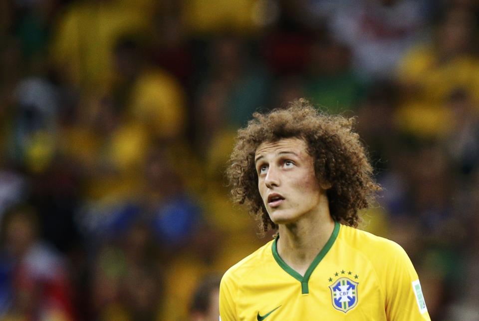 Brazil's David Luiz looks on during their 2014 World Cup third-place playoff against the Netherlands at the Brasilia national stadium in Brasilia July 12, 2014. REUTERS/Ueslei Marcelino (BRAZIL - Tags: SOCCER SPORT WORLD CUP)