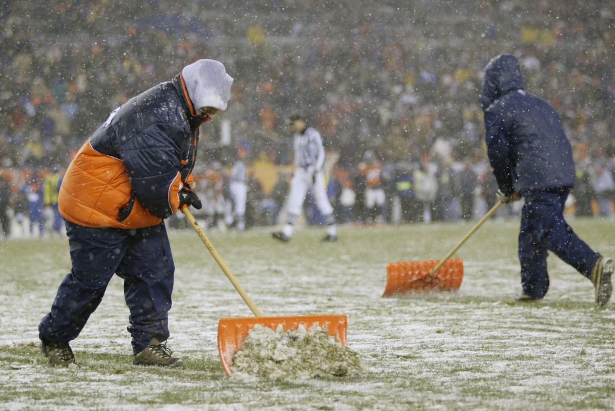 turf crew shovels snow