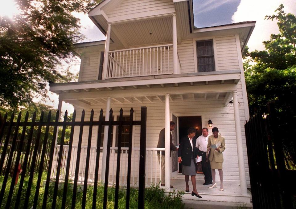 A group of officials from the Florida Secretary of State’s office were taken on a tour of Overtown on Oct. 12, 1999. The tour was led by Dorothy Jenkins Fields, the founder of the Black Archives. The group is seen here leaving the Dorsey House at 250 NW Ninth St. in Overtown.