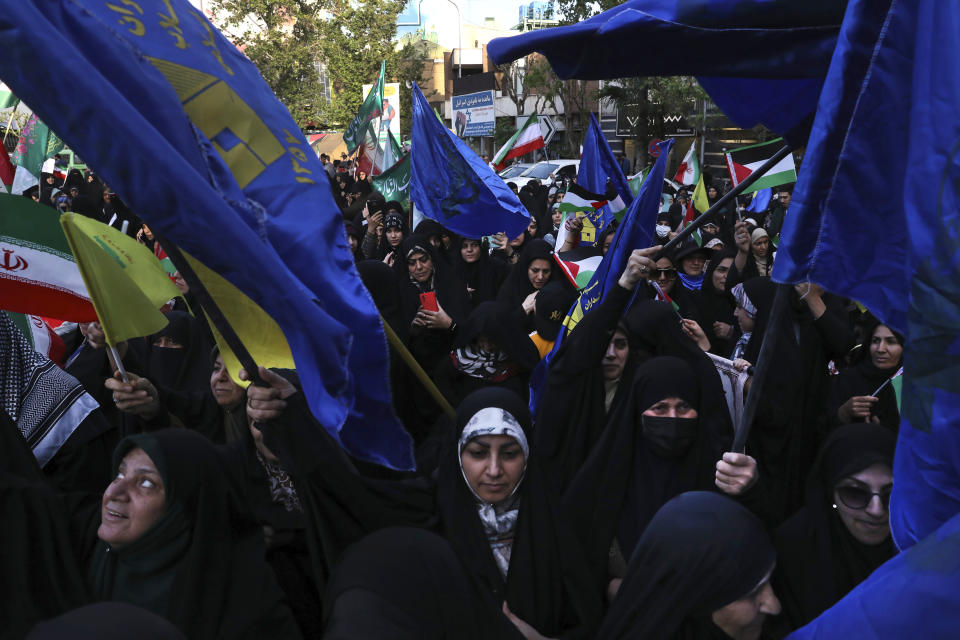 Iranian demonstrators attend an anti-Israeli gathering at the Felestin (Palestine) Sq. in Tehran, Iran, Monday, April 15, 2024. World leaders are urging Israel not to retaliate after Iran launched an attack involving hundreds of drones, ballistic missiles and cruise missiles. (AP Photo/Vahid Salemi)