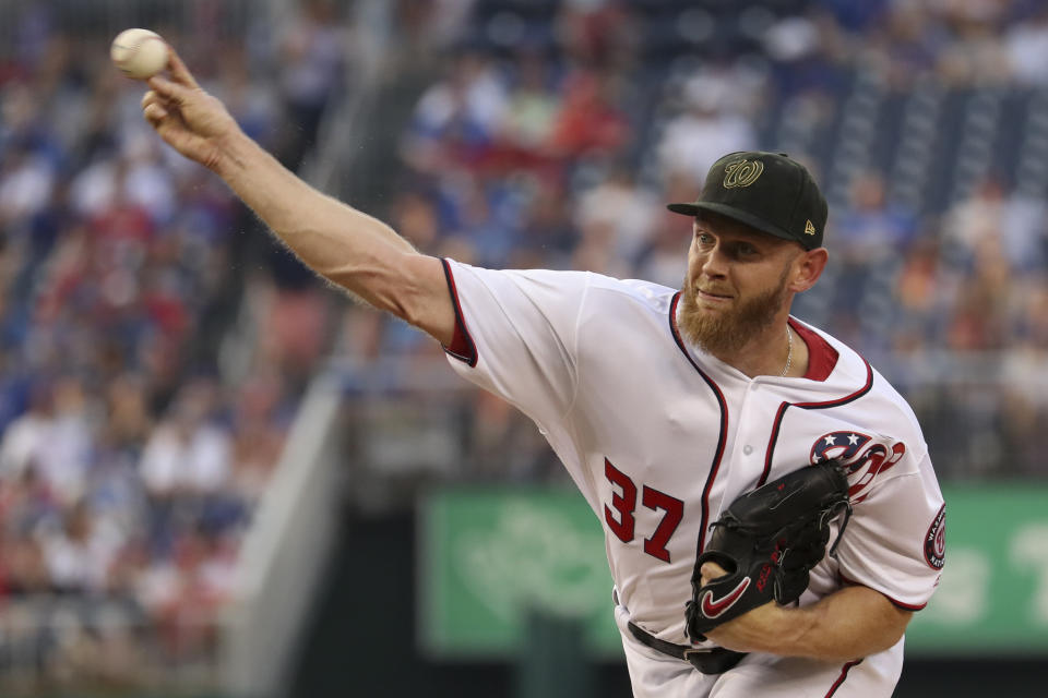 Washington Nationals starting pitcher Stephen Strasburg throws during the first inning of the team's baseball game against the Chicago Cubs, Saturday, May 18, 2019, in Washington. (AP Photo/Andrew Harnik)