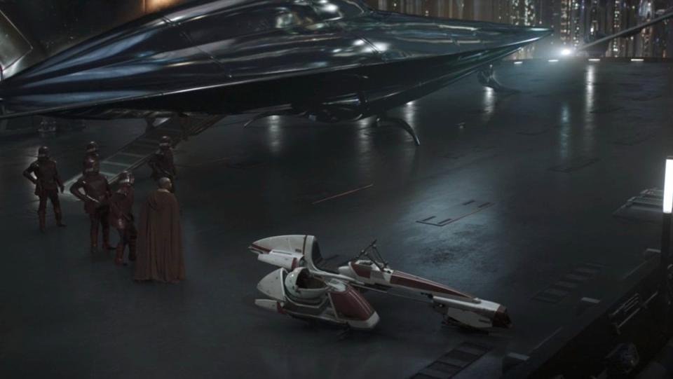 Naboo Royal guards, Kelleran Beq, and Grogu on a platform with a ship on The Mandalorian