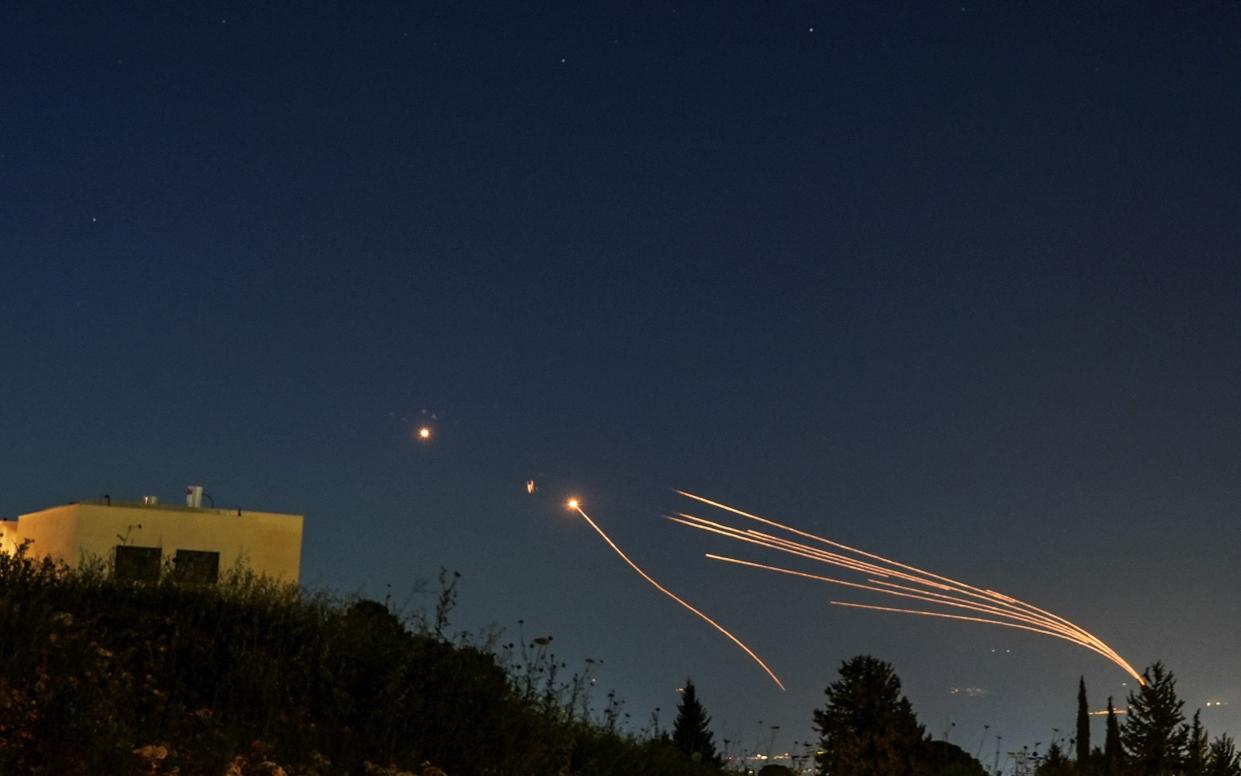 Israel's Iron Dome anti-missile system intercepts rockets launched from Lebanon towards Israel over the Israeli Lebanese border