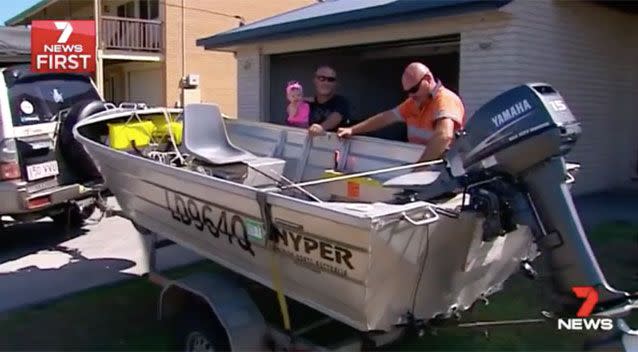 The two fishermen pulled the injured woman into their boat. Source: 7 News