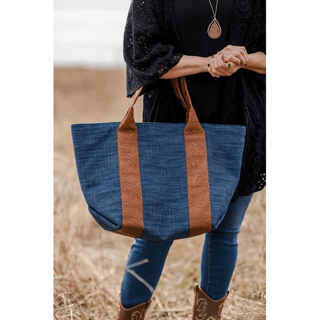 <p><a href="https://go.redirectingat.com?id=74968X1596630&url=https%3A%2F%2Fwww.walmart.com%2Fip%2FThe-Pioneer-Woman-Denim-Tote-Bag%2F2078760185&sref=https%3A%2F%2Fwww.goodhousekeeping.com%2Fbeauty%2Ffashion%2Fa60548368%2Fthe-pioneer-woman-accessories-walmart%2F" rel="nofollow noopener" target="_blank" data-ylk="slk:Shop Now;elm:context_link;itc:0;sec:content-canvas" class="link rapid-noclick-resp">Shop Now</a></p><p>The Pioneer Woman Denim Tote Bag</p><p>walmart.com</p><p>$32.00</p>