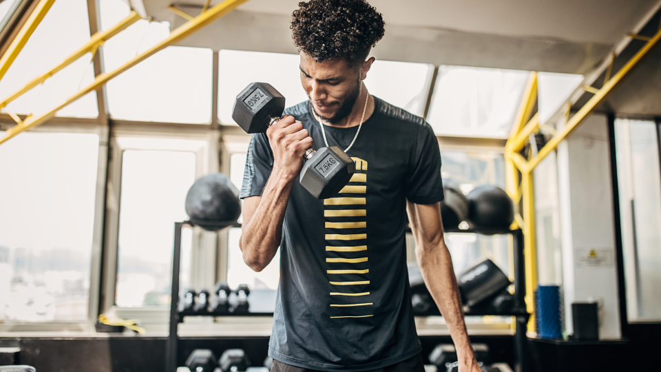 Man doing dumbbell curls