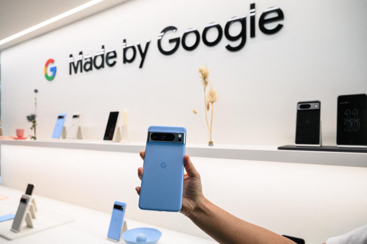 A Google Pixel 8 pro phone is displayed during a product launch event for the Google Pixel 8, and Pixel 8 pro phones, Pixel Watch 2, and Pixel Buds Pro earbuds.