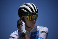 Slovenia's Tadej Pogacar, wearing the best young rider's white jersey takes the start of the fourth stage of the Tour de France cycling race over 171.5 kilometers (106.6 miles) with start in Dunkerque and finish in Calais, France, Tuesday, July 5, 2022. (AP Photo/Daniel Cole )