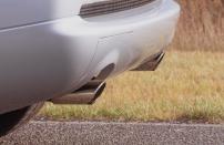 <p>At the other end of the ML55 AMG, large chrome-tipped exhaust pipes emitted a deep V-8 rumble. </p>