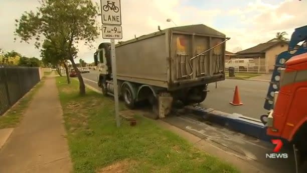 Two wheels that flew off this truck left a trail of destruction along a busy Adelaide street. Photo: 7 News