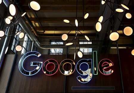 A neon Google sign is seen in the foyer of Google's new Canadian engineering headquarters in Kitchener-Waterloo, Ontario, January 14, 2016. REUTERS/Peter Power/File Photo