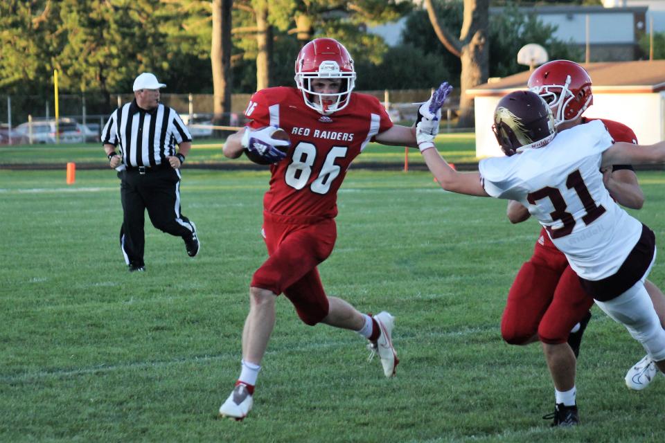 Spaulding's Emmett Colby (86) looks for daylight during the Friday, Sept. 2, 2022 season-opener against Alvirne in Rochester. Spaulding came away with a 36-13 win over the Broncos.