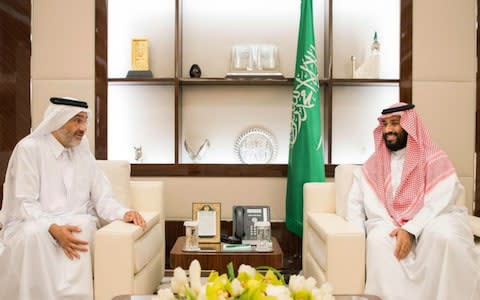 Saudi Arabia's powerful Prince Mohammed bin Salman (left) met with a relatively unknown Qatari royal, Abdullah bin Ali bin Jassim al-Thani - Credit: HANDOUT/AFP/Getty Images