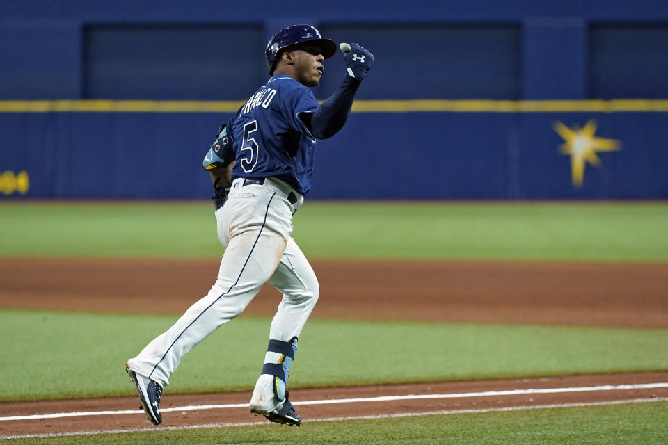 Tampa Bay Rays' Wander Franco reacts as he runs around the bases after his three-run home run off Boston Red Sox starting pitcher Eduardo Rodriguez during the fifth inning of a baseball game Tuesday, June 22, 2021, in St. Petersburg, Fla. (AP Photo/Chris O'Meara)