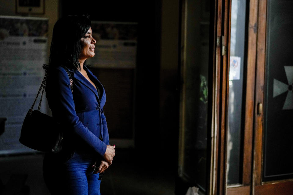 Carla Segovia, a transgender woman from Argentina, walks out of the Beata Vergine Immacolata parish church in Torvaianica, Italy, Thursday, Nov. 16, 2023. Pope Francis’ recent gesture of welcome for transgender Catholics has resonated strongly in this working class, seaside town south of Rome, where a community of trans women has found help and hope through a remarkable friendship with the pontiff forged during the darkest times of the pandemic. (AP Photo/Andrew Medichini)