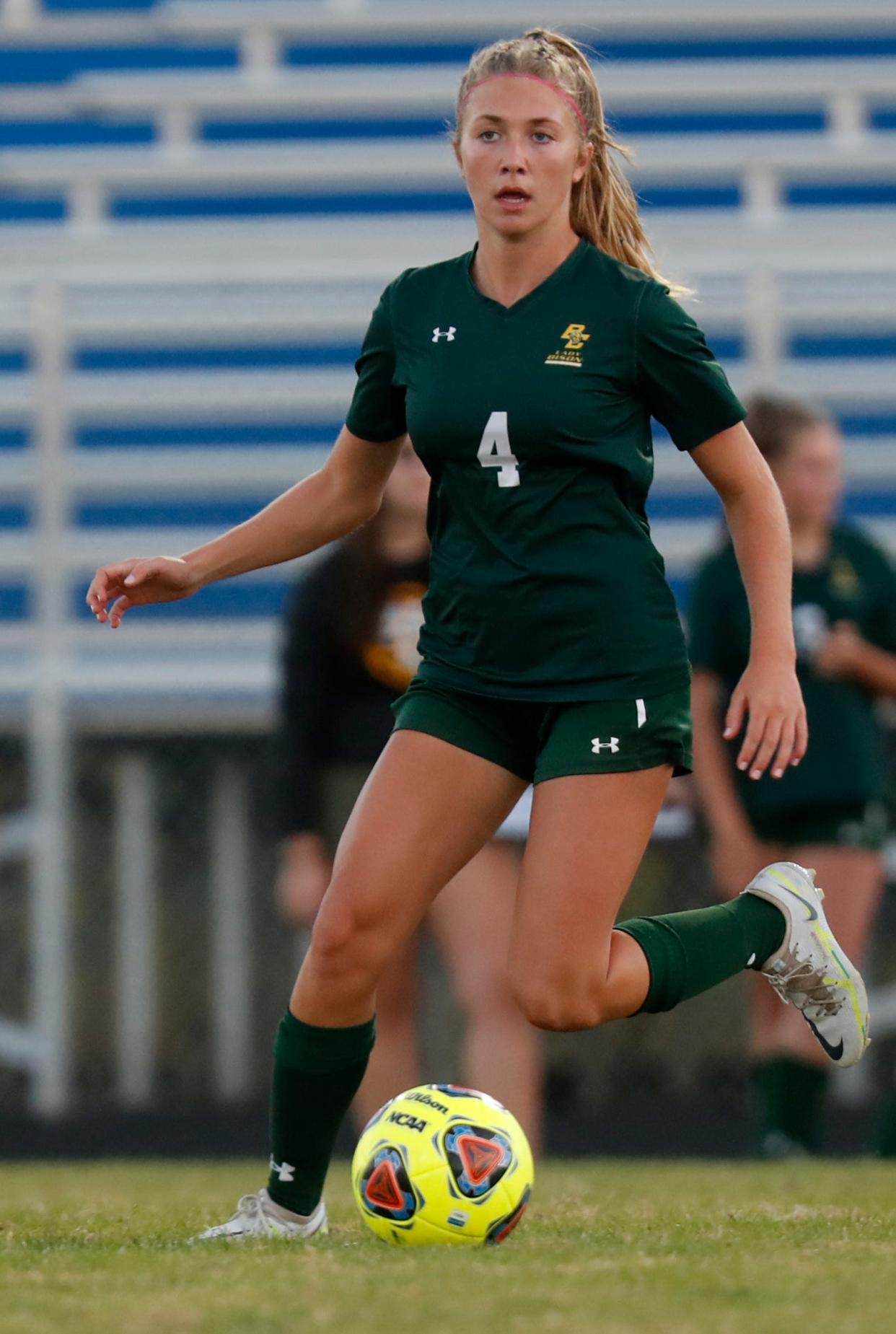 Benton Central Bison Avery Hardebeck (4) dribbles the ball during the IHSAA sectional girls soccer game against the North White Vikings, Tuesday, Oct. 4, 2022, at Central Catholic High School in Lafayette, Ind. 