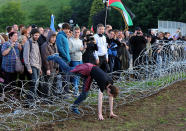 G8 Protesters break through an outer fence during a protest near the G8 summit in Loch Erne, Enniskillen.