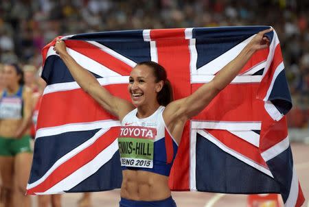 Aug 23, 2015; Beijing, China; Jessica Ennis-Hill (GBR) poses with British flag after winning the heptathlon with 6,669 points during the IAAF World Championships in Athletics at National Stadium. Mandatory Credit: Kirby Lee-USA TODAY Sports