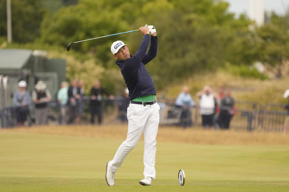 FILE - Chan Kim, of the U.S., hits off the 18th tee during the first round of the British Open golf championship on the Old Course at St. Andrews, Scotland, July 14 2022. The 33-year-old Kim, who grew up in Hawaii, has won the last two Korn Ferry Tour events to secure a PGA Tour card for the 2024 season. (AP Photo/Gerald Herbert, File)