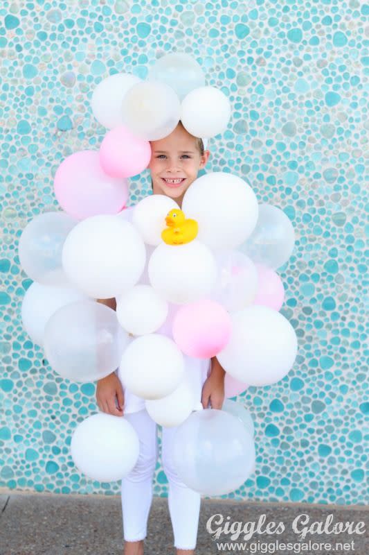 <p>The most time-consuming part of assembling this DIY? Blowing up the balloons—take breathing breaks! </p><p><strong>Get the tutorial at <a href="https://gigglesgalore.net/diy-bubble-bath-halloween-costume" rel="nofollow noopener" target="_blank" data-ylk="slk:Giggles Galore;elm:context_link;itc:0;sec:content-canvas" class="link ">Giggles Galore</a>. </strong></p><p><strong><a class="link " href="https://www.amazon.com/Munchkin-White-Safety-Bath-Ducky/dp/B000GUZC2A/?tag=syn-yahoo-20&ascsubtag=%5Bartid%7C10050.g.23785711%5Bsrc%7Cyahoo-us" rel="nofollow noopener" target="_blank" data-ylk="slk:SHOP RUBBER DUCK;elm:context_link;itc:0;sec:content-canvas">SHOP RUBBER DUCK</a><br></strong></p>