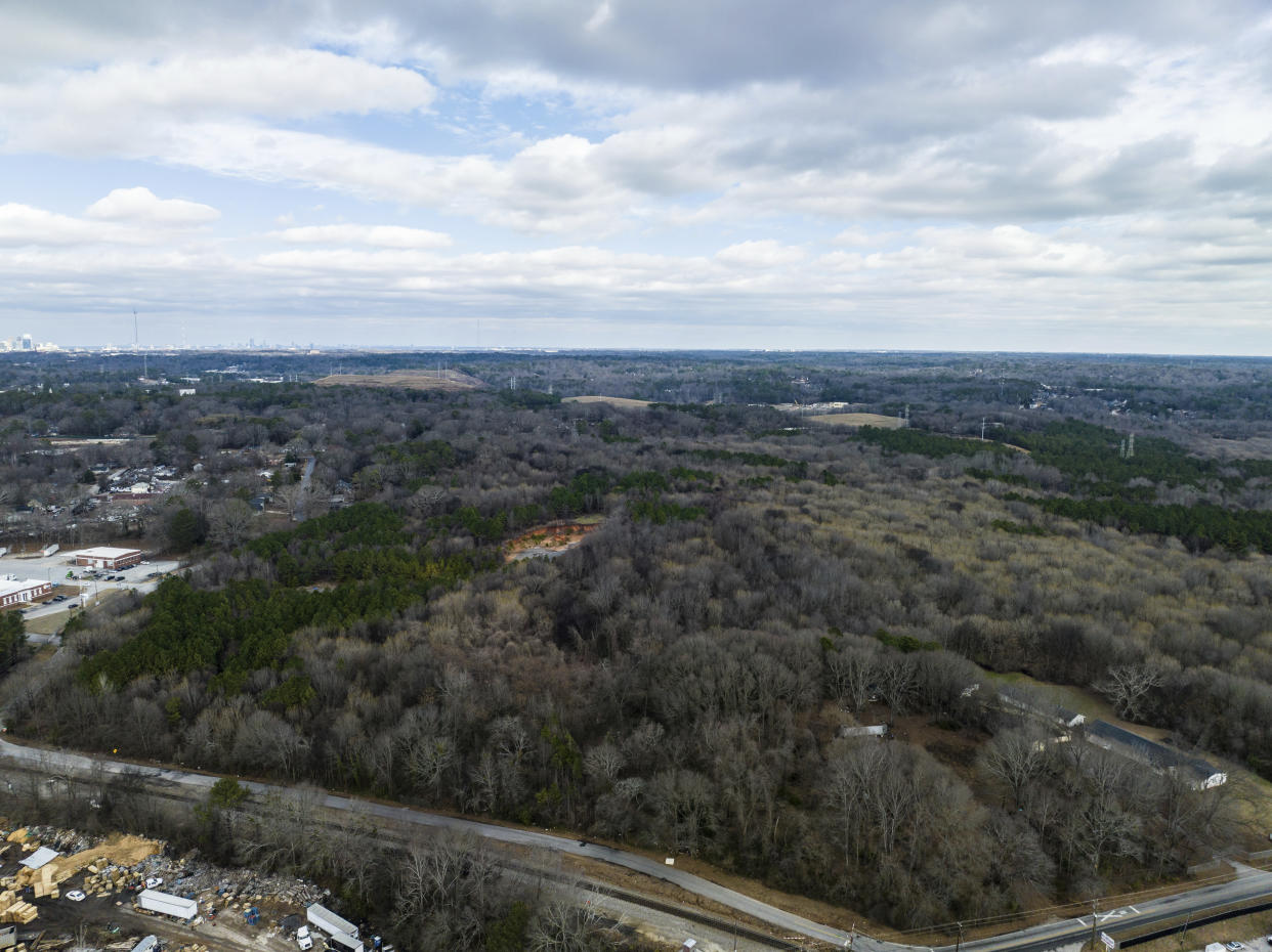 In this aerial view, land owned by the city of Atlanta is shown, Thursday, Jan. 26, 2023, in unincorporated DeKalb County. The Atlanta City Council has approved plans to lease the land to the Atlanta Police Foundation so it can build a state-of-the-art police and firefighter training center, a project that protesters derisively call “Cop City.” (AP Photo/Danny Karnik)