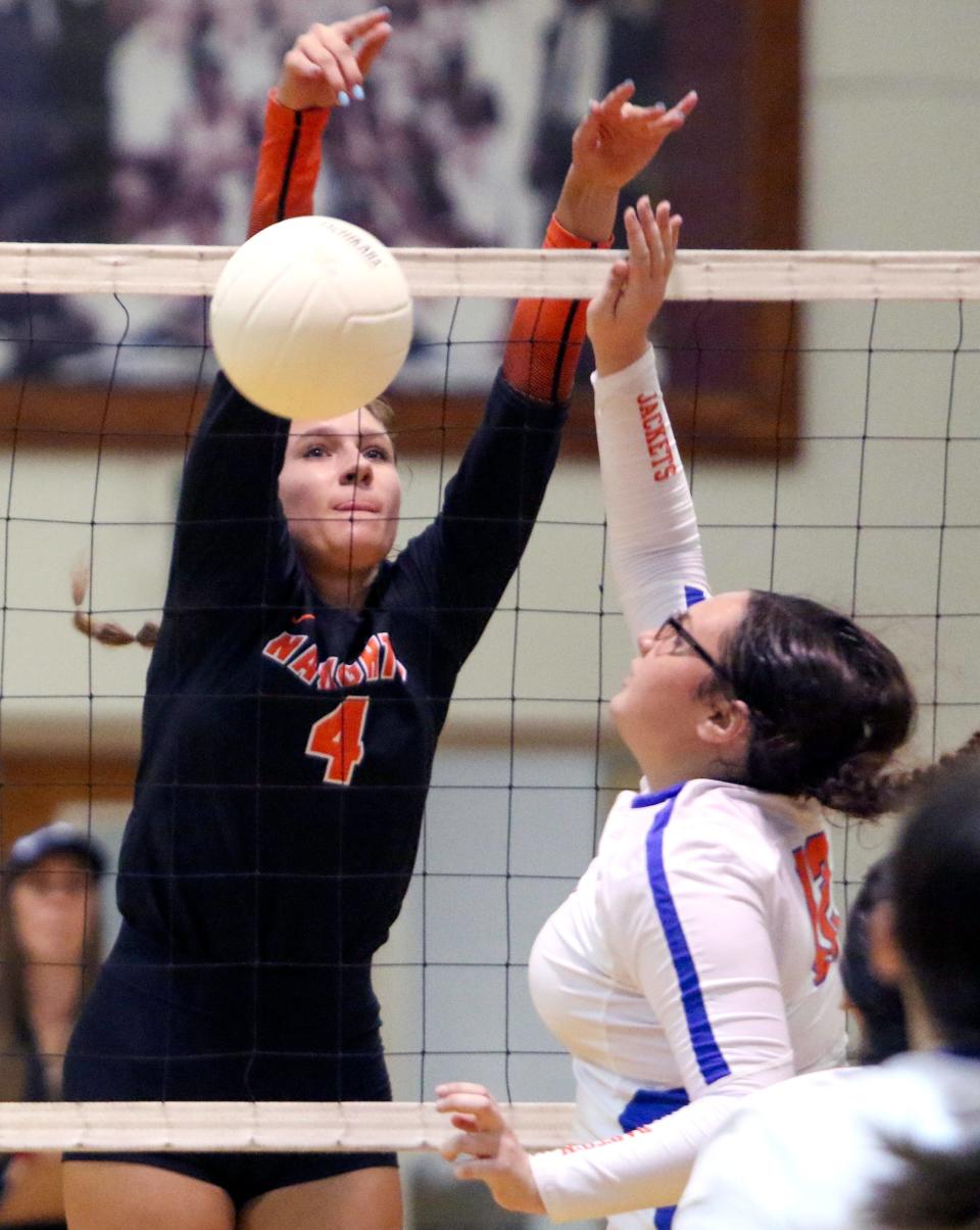 Lakeland's Erin Miller goes up for a block against Bartow during volleyball action last week.