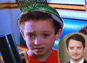 Elijah Wood in 'Back to the Future II' When Elijah was just 8 he made his first big screen appearance in the 1989 film 'Back to the Future II' playing 'Video Game Boy'.