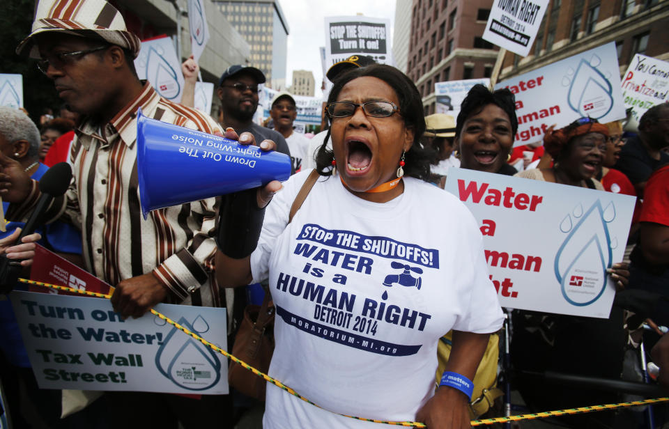 People gather to protest against the mass water shut-offs to Detroit citizens behind in their payments during a demonstration in downtown Detroit (Rebecca Cook / Reuters file)