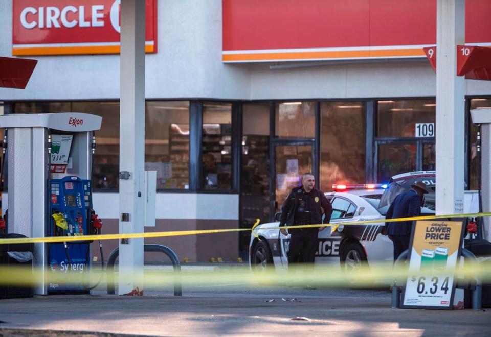 Durham police investigate the scene where a man was fatally shot by officers at the Circle K gas station near Fayetteville Road and N.C. Highway 54 on Wednesday, Jan. 12, 2022.