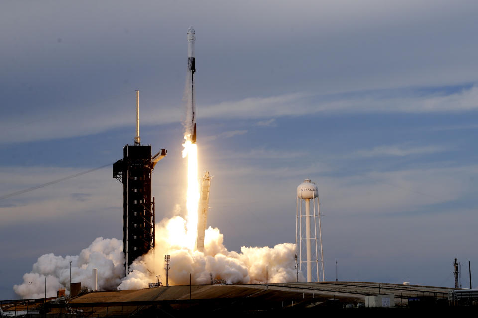 A SpaceX Falcon 9 rocket, with the Dragon capsule and a crew of four private astronauts, lifts off from pad 39A, at the Kennedy Space Center in Cape Canaveral, Fla., Sunday, May 21, 2023. (AP Photo/John Raoux)