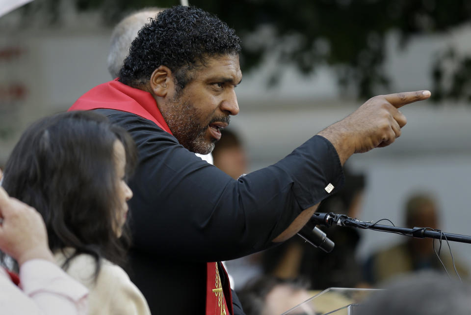 Rev. William Barber, President of the North Carolina Chapter of the NAACP, leads a Moral Monday protest against actions taken by the state's Republican legislature including enacting a racial gerrymander and limiting voting rights. (Photo: ASSOCIATED PRESS)