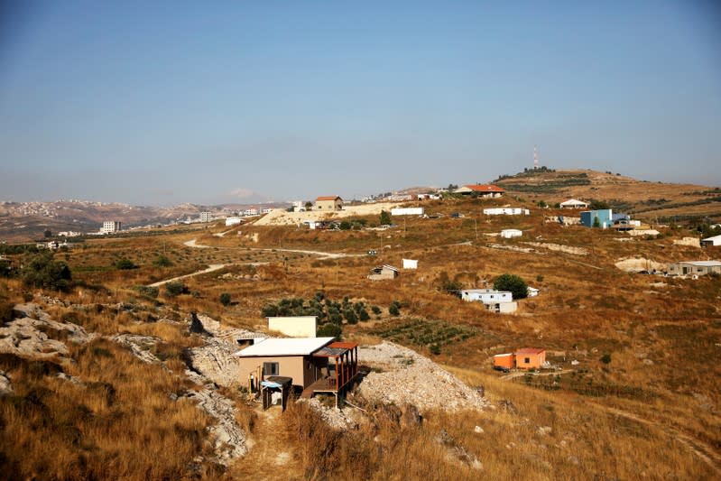 FILE PHOTO: Houses are seen in the landscape in this general view picture of the Israeli settlement of Havat Gilad in the occupied West Bank