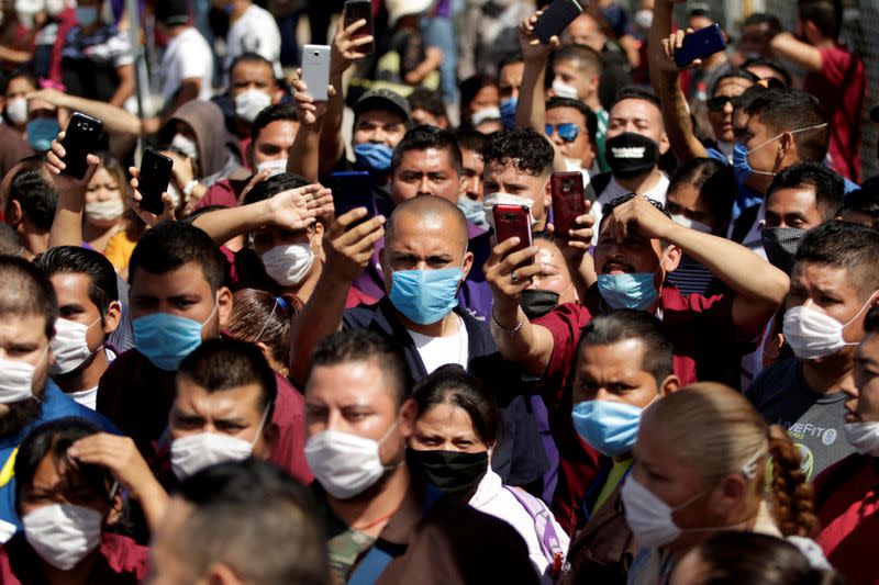 FILE PHOTO: Employees of Electrocomponentes de Mexico are seen during a protest to halt work amid the spread of the coronavirus disease (COVID-19), in Ciudad Juarez