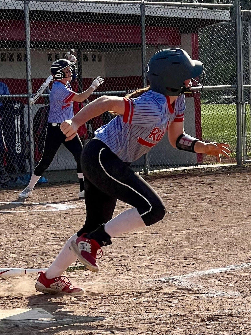 Ridgedale's Lilly Ruth watches her home run during a home softball game with North Baltimore last week.