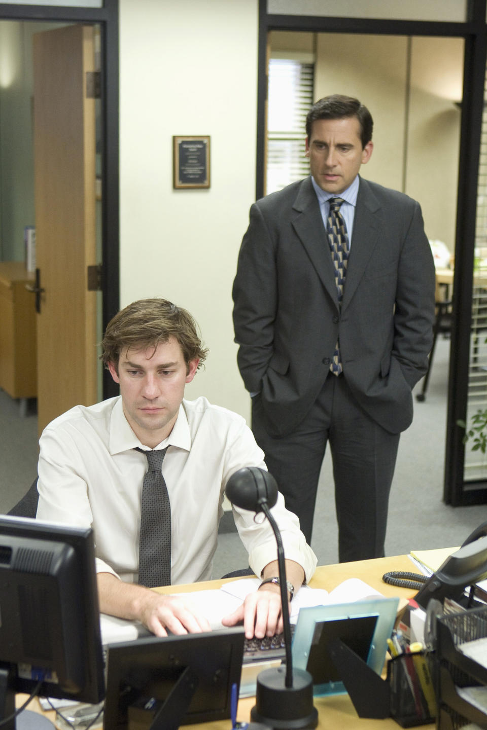 THE OFFICE -- "Customer Survey" Episode 6 -- Pictured: (l-r) John Krasinski as Jim Halpert, Steve Carell as Michael Scott  (Photo by Paul Drinkwater/NBCU Photo Bank/NBCUniversal via Getty Images via Getty Images)