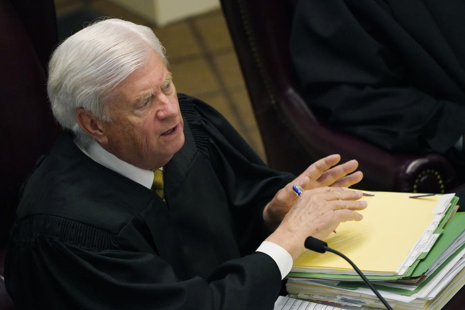 Mississippi Supreme Court Chief Justice Michael Randolph questions attorneys presenting arguments over a lawsuit that challenges the state's initiative process and seeks to overturn a medical marijuana initiative that voters approved in November 2020, Wednesday, April 14, 2021, in Jackson, Miss. (AP Photo/Rogelio V. Solis)