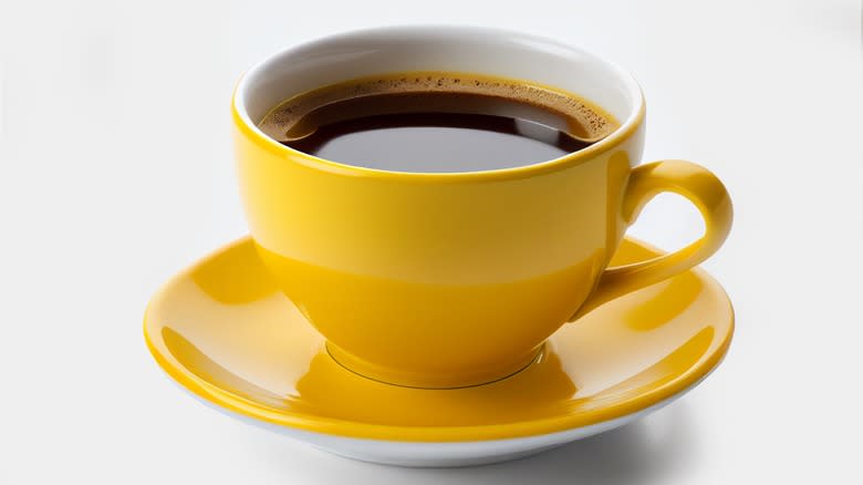 yellow cup of coffee