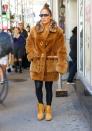 <p>Jennifer Lopez is ready for fall in a fur coat and black leggings in N.Y.C. on Sept. 24. </p>