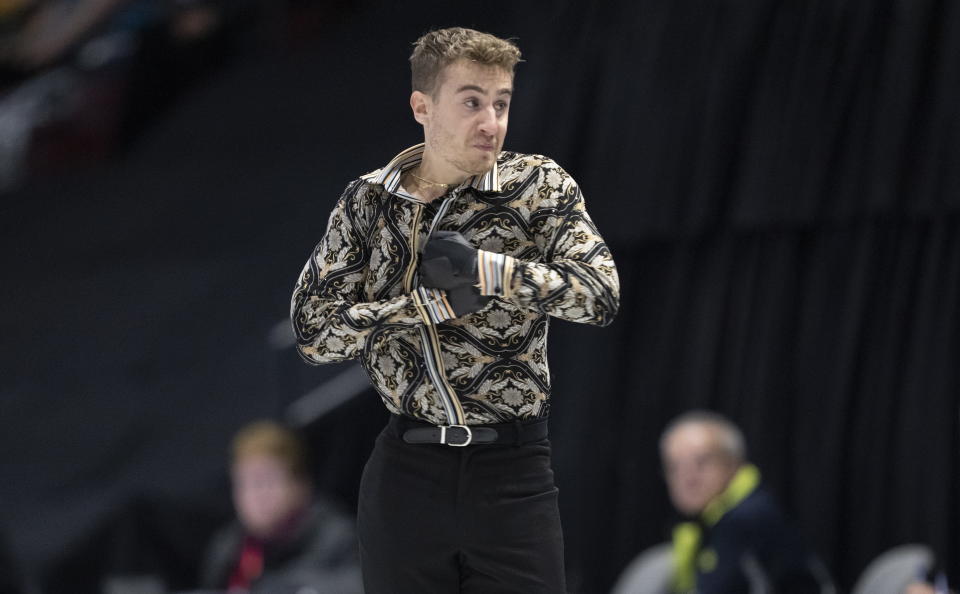 Matteo Rizzo of Italy performs his free program during the men's competition at the Skate Canada International figure skating competition in Mississauga, Ontario, on Saturday, Oct. 29, 2022. (Paul Chiasson/The Canadian Press via AP)