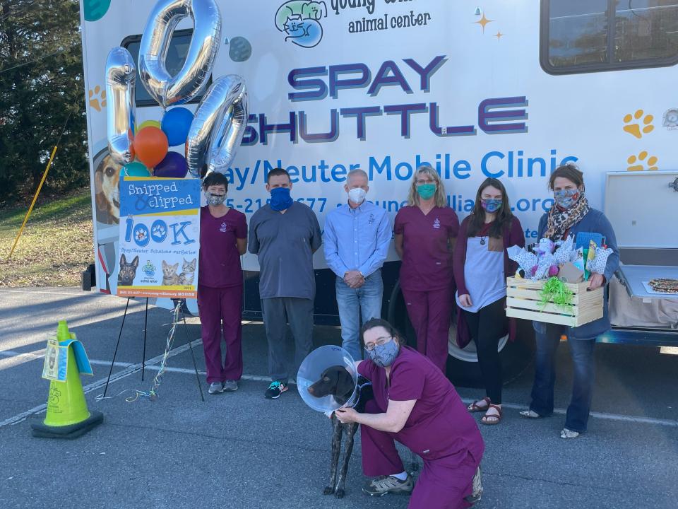 Young-Williams Animal Center’s Spay/Neuter Solutions celebrated a milestone of reaching 100,000 spay and neuter surgeries for pets on Feb. 23 at Chilhowee Park. Shown with Zelda, front, is Young-Williams Animal Center medical director Dr. Lisa Chassy. In back are the Spay/Neuter Solutions team, Zelda's owner, Kelcie Chandler, and YWAC CEO Janet Testerman, holding the goody box. Feb. 23, 2021.