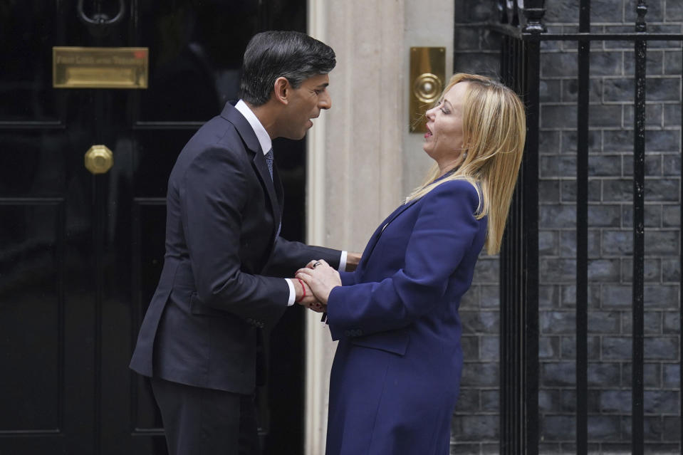 Britain's Prime Minister Rishi Sunak, left, welcomes Italian Prime Minister Giorgia Meloni to 10 Downing Street in London, Thursday, April 27, 2023. (James Manning/PA via AP)