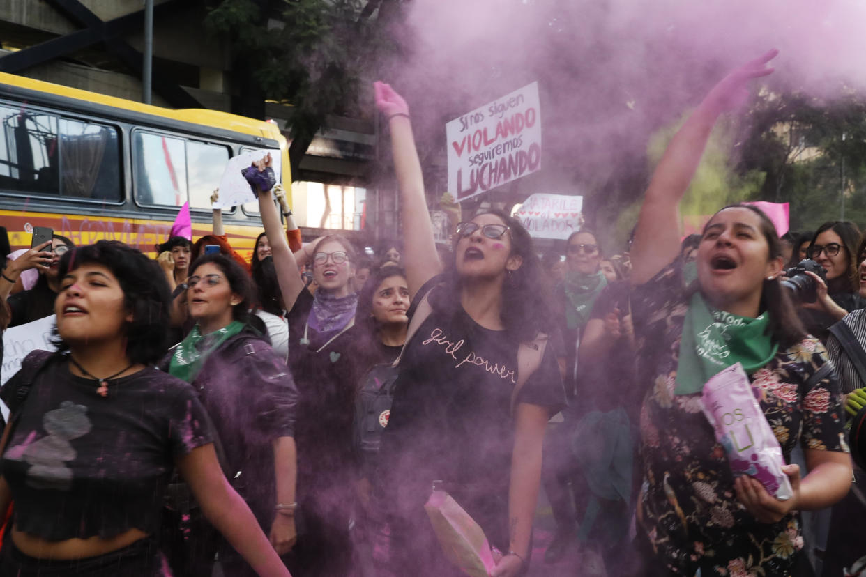 Women march during a protest demanding justice and for their safety, sparked by two recent alleged rapes by police, in Mexico City, Friday, Aug. 16, 2019. (AP Photo/Marco Ugarte)